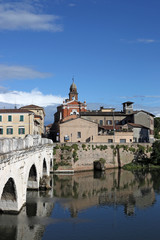 old town and Tiberius bridge in Rimini Italy