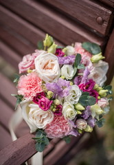 beautiful wedding bouquet on the bench