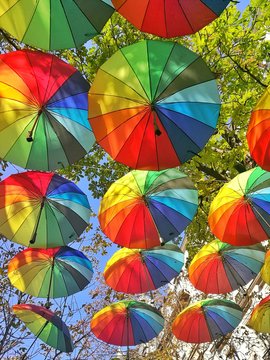 colorful umbrellas on a background of blue sky