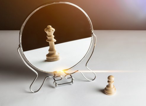 Chess Pawn Looking in the Mirror and Seeing a Queen