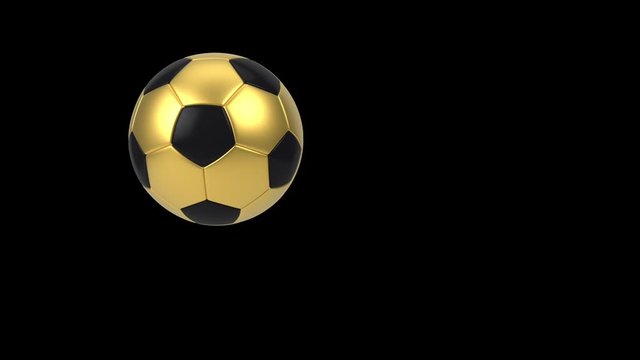 Realistic black and gold soccer ball isolated on black background. 3d looping animation.