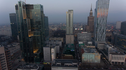 Aerial view of modern skyscrapers of Warsaw. Poland. 04. December. 2018. Warsaw skyline with urban skyscrapers at sunset.