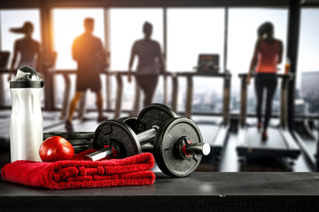 Dumbbells in gym interior and free space for your decoration. 