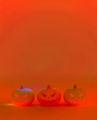 3D rendering illustration Halloween pumpkin glowing on orange space