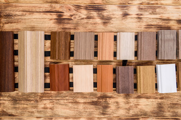 Wooden samplers on table close up .