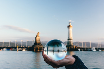 Reflection of the famous waterfront of Lindau in a crystal ball, Lindau, Bodensee, Germany