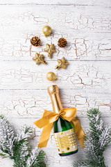 Bottle of champagne in a gold wrapper