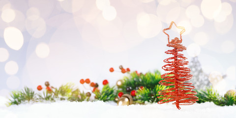 Red Christmas Tree On Snow With Fir Branch.