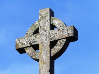 Stone Celtic cross. The Celtic cross is a form of Christian cross featuring a nimbus or ring that...