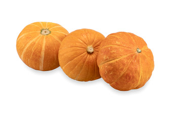 Three stacked mini pumpkins over white