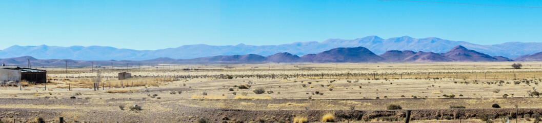 Fototapeta na wymiar Panoramic photography on the road from Jujuy to Bolivia with mountain ranges in the background