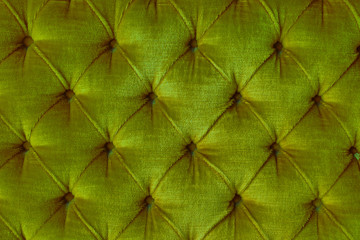 Shiny velvet golden brown sofa texture