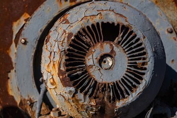  This is a part of an electric motor. A protective cap with traces of corrosion.