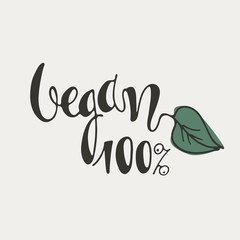 Vegan 100 percent. Hand lettering decorated with a green leaf isolated on white background. Icon, logo, banner