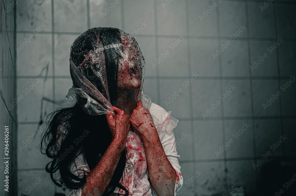 Wall mural a woman is brutally murdered by a bag over her head. feeling tortured and needing help, halloween mu