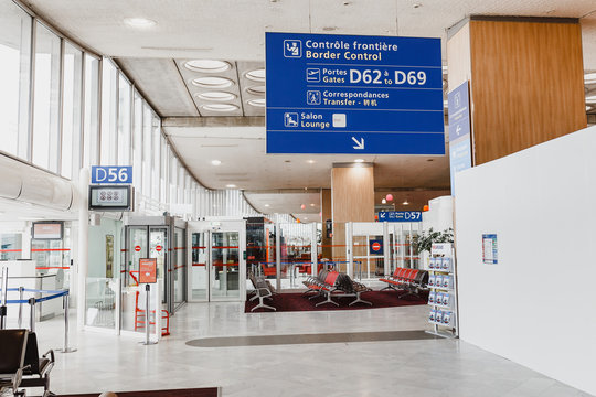FRANCE PARIS, THE AIRPORT OF CHARLES DE GAULLE, March 17, 2017: Interior of CDG airport with a sign for the passenger on the gates and customs control