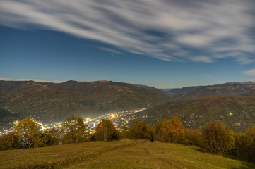 Village in the mountains on an autumn night