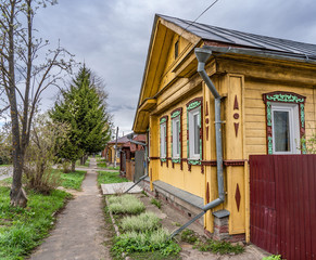 Street with old wooden houses in Suzdal, a well preserved old Russian town-museum. A member of the Golden ring of Russia