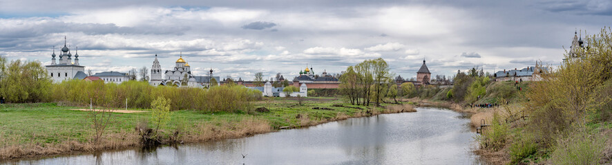 Panoramic view of Kamenka river and two monasteries in Suzdal. Well preserved old Russian town-museum. A member of the Golden ring of Russia