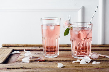 Cocktail of rose syrup, lemonade.