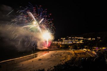 Looe New Years Eve fireworks display at the beach Cornwall