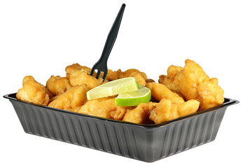 Kibbeling in a plastic tray isolated on white background. Kibbeling is a Dutch snack consisting of...
