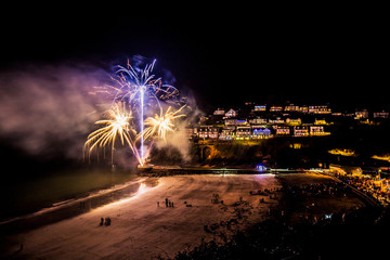 Looe New Years Eve fireworks display at the beach Cornwall