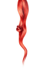 Red hair knot isolated on white background. Long wavy ponytail