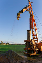 Ground water hole drilling machine installed on a truck. Groundwater well drilling.
