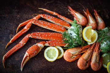 Crab legs on brown rustic background