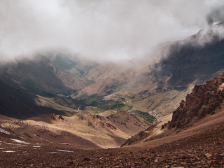 Misty view of High Atlas valley from above altitude in Toubkal region, Morocco, Africa