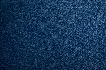 Leather texture close up. Dark blue fashionable background, top view. Stylish wallpaper of snake...