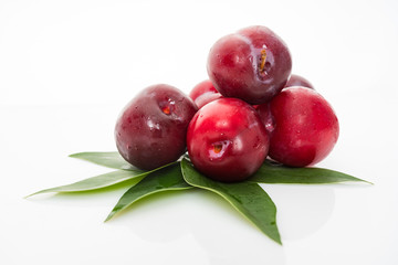 fresh plum isolated on white background