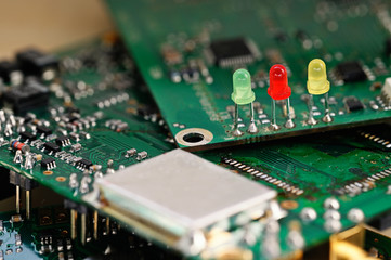 Three colored LEDs on a printed circuit board.