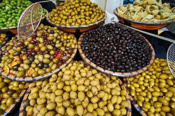 Green and black olives in the oriental market