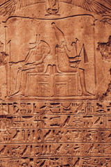 old egypt hieroglyphs carved on the stone