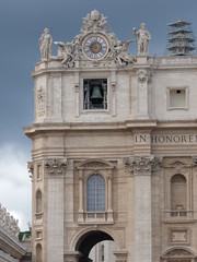 Fototapeta na wymiar Belfry tower of San Pietro (St Peter) Papal Basilica in Vatican city