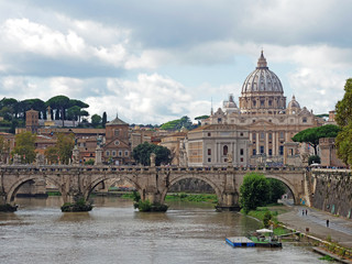 Fototapeta na wymiar Ponte Vittorio Emanuele bridge and Papal Basilica of San Pietro in Vatican seen from Ponte Sant Angelo