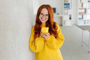 Pretty young redhead woman with a sweet smile