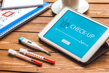 concept time health check up on wooden background