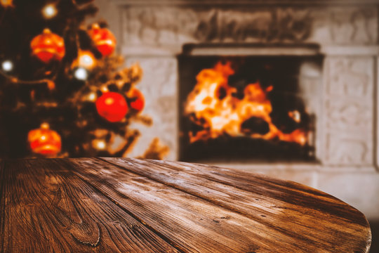 Table background of free space and fireplace of christmas time 