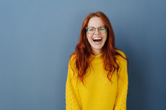 Young redhead woman with lovely sense of humor
