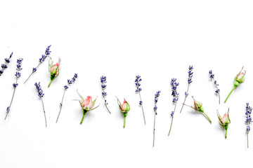 Fototapeta premium pattern of flowers on white background top view mock up