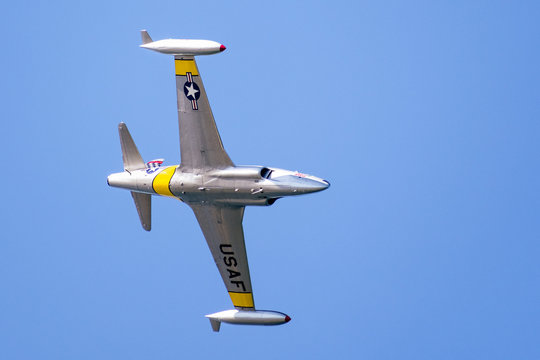 Oct 12, 2019 San Francisco / CA / USA - Ace Maker Airshow Lockheed T-33 aircraft taking part at the 39th Fleet Week event; blue sky background