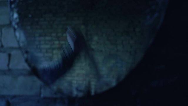 Hand of cruel murderer stabbing victim with bloody knife, mirror reflection