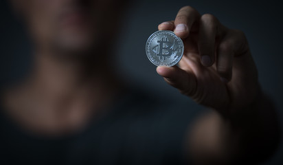 Bitcoin - Cryptocurrency concept - cryptocurrency being held as a value conserving asset as well a...