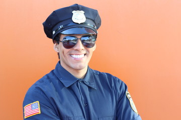 American cop in orange background 
