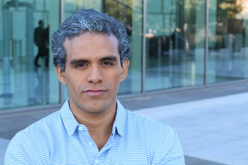 Ethnic entrepreneur with salt and pepper hairstyle 