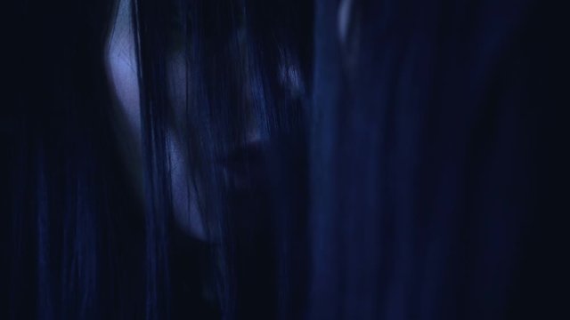 Schizophrenic patient looking in mirror having split personality mental disorder