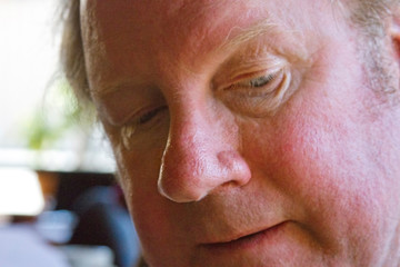 Close Up of Older Mans Face Lost in Thought